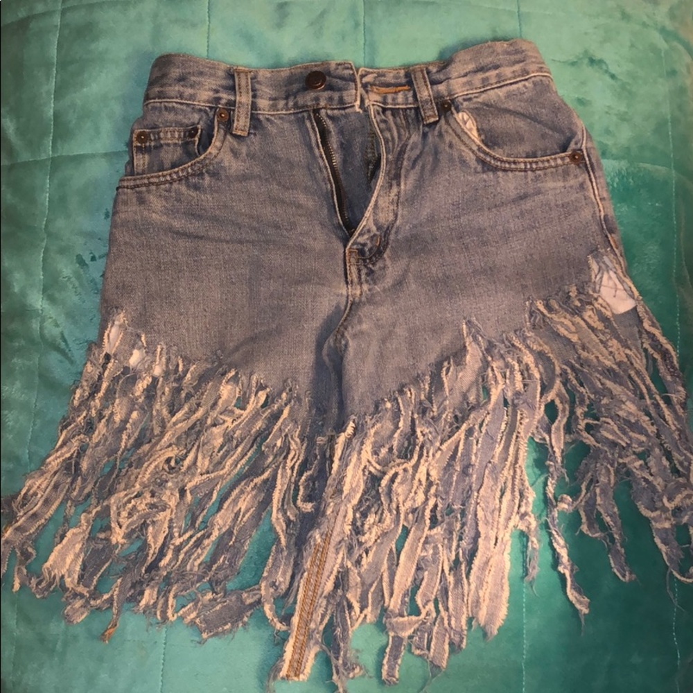 Fringe denim shorts.